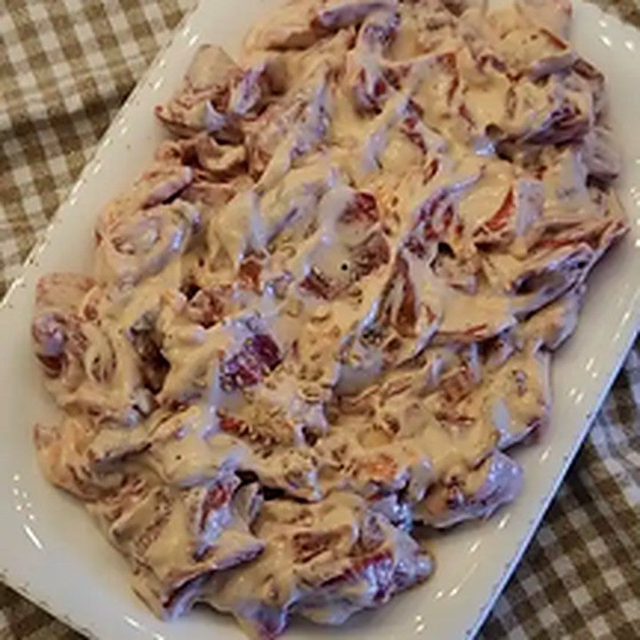 Kozbiber — Strained-yogurt meze with sautéed mushroom, onion and garlic.