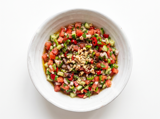 Ezme Salata — Finely chopped tomato, pepper and parsley salad with pomegranate molasses.